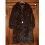 A brown Squirrel fur ladies jacket,