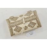 A Japanese ivory reticulated clutch purse, Meiji period, 1868-1912,