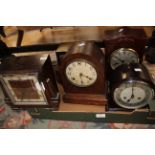 Five various early 20th Century eight day mantle clocks,