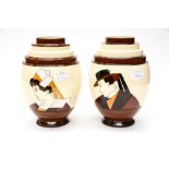 A pair of Quimper Art Deco vases, in cream and brown, having stepped shoulders,