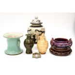 A collection of Chinese vessels, including sang de boeuf,