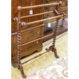 A Victorian walnut shower rail AF