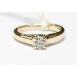 A diamond 18ct white gold solitaire ring,