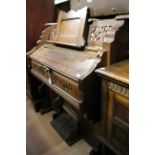 A 20th Century harmonium, having five octaves,