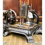 An 1880s The Nelson by the American Sewing Machine Company cast iron sewing machine