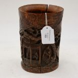 A 19th Century Chinese bamboo brush pot, carved in relief with elders and pagoda scenes,