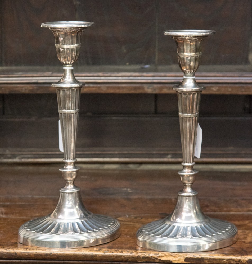 A pair of William Hutton & Sons EPNS neo-classical style candlesticks,