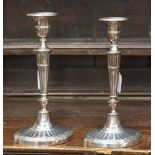 A pair of William Hutton & Sons EPNS neo-classical style candlesticks,