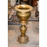 A brass jardiniere fixed to stand,