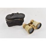 A pair of 19th Century ivory opera glasses with brass fittings, Spinelli and Mahier J.