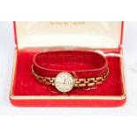 A ladies working 9ct gold Roamer bracelet watch, gross weight approx 13gms,