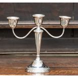A Sheffield 1979 filled silver three branch candelabra with simple elegant design, J.N.L.
