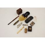 A collection of various items, including ivory letter opener, silver and mother of pearl pen knife,