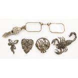 A pair of Art Deco Pinz Nez modelled as a dress clip, decorated with marcasite, a lobster brooch,