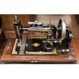 A 1900s Defiance American case sewing machine