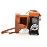 A leather cased Kodak Junior 2 folding camera