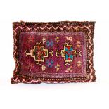 A small puce Afghan saddle bag cushion (numbered 240)