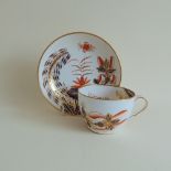 A Spode tea cup and saucer, Pattern 2214, circa 1820, uppercase Spode in red, cup,