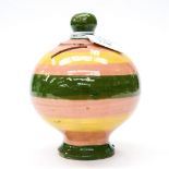 A Sussex or Donyatt type pottery moneybox, late 19th century, clay body, turnip form,