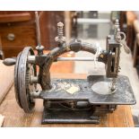 An 1870s 'Champion' American cast iron sewing machine