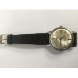A gentleman Longines, conquest automatic waterproof wristwatch, with white metal case,