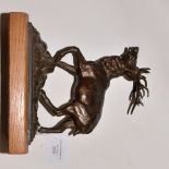 Cast metal model of a stag on an oak base (1)