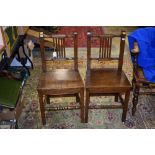 Four 19th Century regional oak bar back chairs with vertical bars,