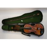 A cased Violin, with bow,