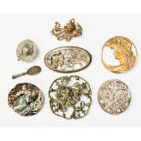 A collection of eight brooches to include silver, Art Nouveau, modern and art Nouveau style,