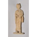 A carved sectional Meji period ivory Geisha,