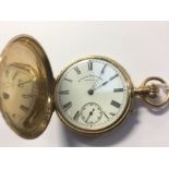 A 10 ct yellow gold, Hunter Pocket watch, with American movement by A.M. Watch Co.