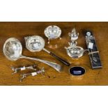 A collection of silver tableware, including a George V 'Old English' pattern soup ladle,