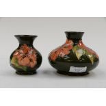 A Moorcroft squat vase, Hibiscus on green ground,