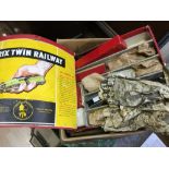 One box of assorted boxed Trix Railway items to include track and engines