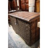 A 18th Century or later iron bound and brass studded chest,