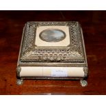 Faux ivory casket with watercolour painting in a central oval on lid, indistinctly signed,