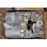 A box of Oriental ceramics to include a ceramic brush pot, prayer wheel,