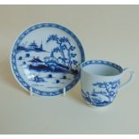 A Worcester blue and white coffee cup and saucer, 'Canon Ball' pattern.