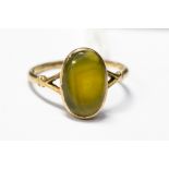 A 9ct gold 1920's ring set with a banded agate, size P,