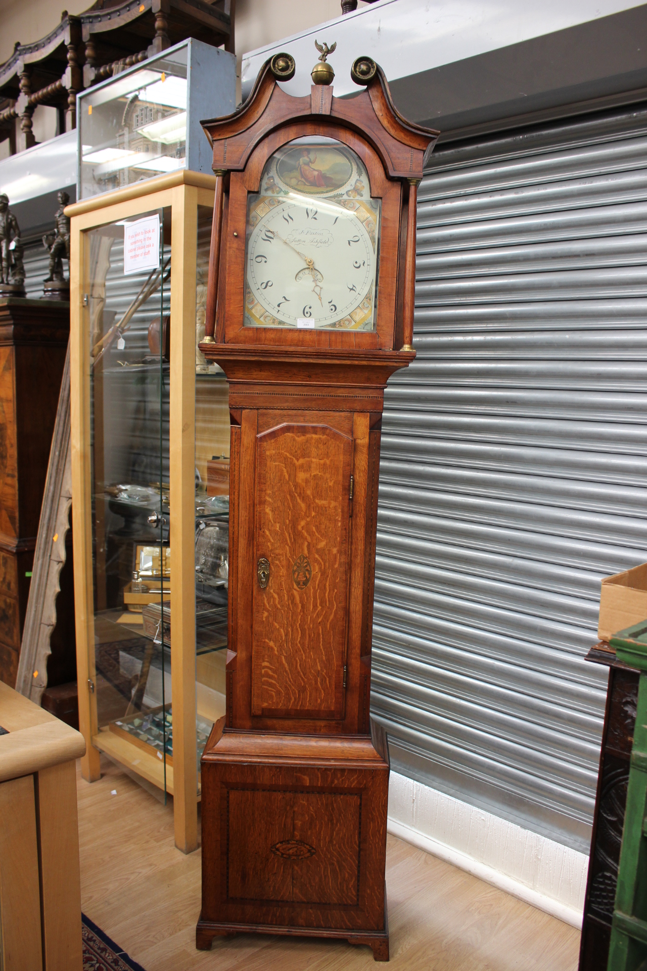 An early 19th Century oak and mahogany cross-banded longcase clock, by J Foxton, Sutton Ashfield,