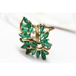 An emerald and diamond cluster ring, mounted in 9ct gold,