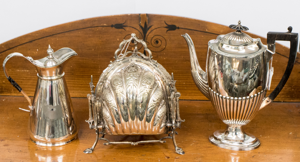 A large silver plated bon bon/sweetmeats server with shell shaped clouses to each side,