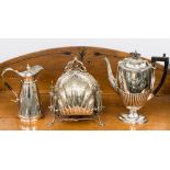 A large silver plated bon bon/sweetmeats server with shell shaped clouses to each side,