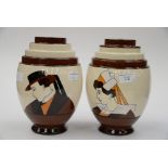 A pair of Quimper Art Deco vases, in cream and brown, having stepped shoulders,