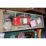 Two 1950's design tin plate friction cars and a boxed Toulonnaise billing boat,