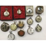 A collection of white metal pocket watches including brands such as Smiths, Jordan & Benet,