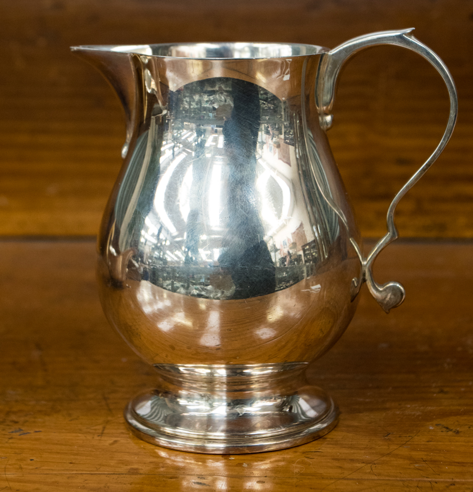 A silver baluster milk jug, London 1972-1973, Wakely and Wheeler,