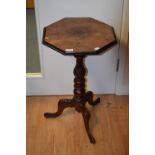 An early Victorian octagonal topped tripod table,