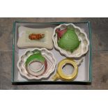 Two Royal Winton jelly mould, with two Royal Winton jam pots and covers, a butter dish,