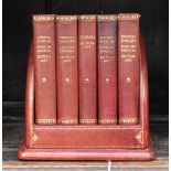 'Collins Gem Dictionary', four gilt tooled leather bound volumes on a matching stand, English,